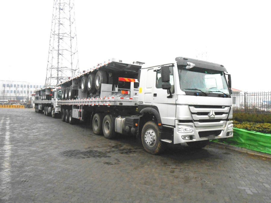 5 units Howo tractor truck and flatbed trailer loaded on the ship for the Ghana Customer