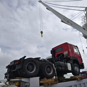 HOWO 400hp tractor truck and cargo truck and the 3 units flatbed trailers will be export to Congo