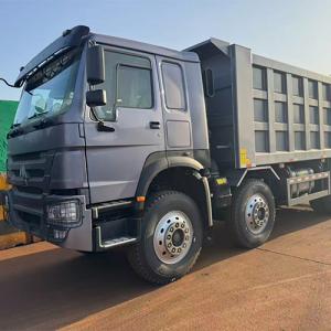 HOWO Dump Trucks Arrive at China Port, Awaiting Shipment to Mauritania