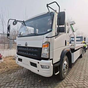 Two HOWO Wrecker Trucks Arrive at Port and Ready for Shipment to the Republic of the Congo