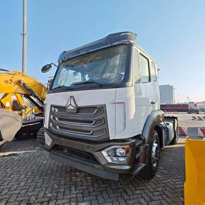 One Used HOWO NX 42 Tractor Truck Arrives at Port for Shipment to Guinea
